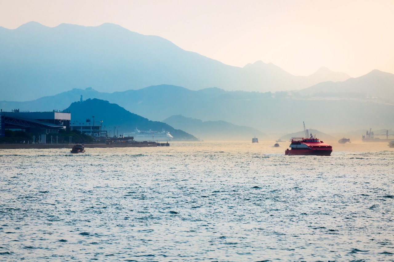 Hong Kong harbor with ferry boat pass between Hong Kong and Macau